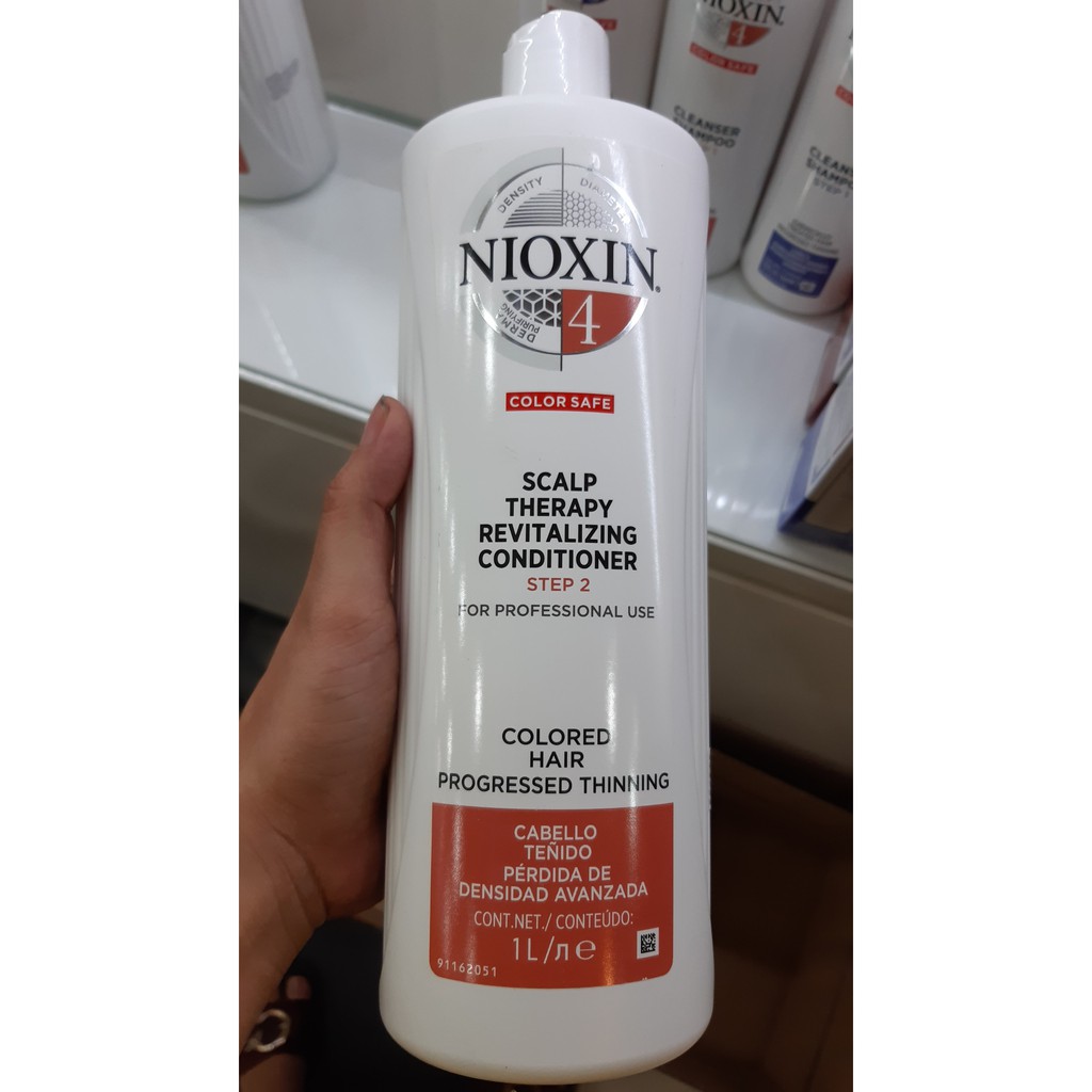 Dầu xả chống rụng tóc Nioxin System 4 Conditioner 1000ml ( New 2019) - Colored Hair