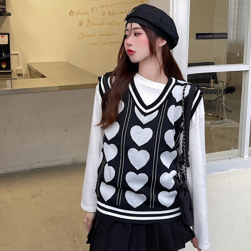 Áo len không tay cổ chữ V dáng rộng màu hồng dễ phối đồ cho nữ | BigBuy360 - bigbuy360.vn