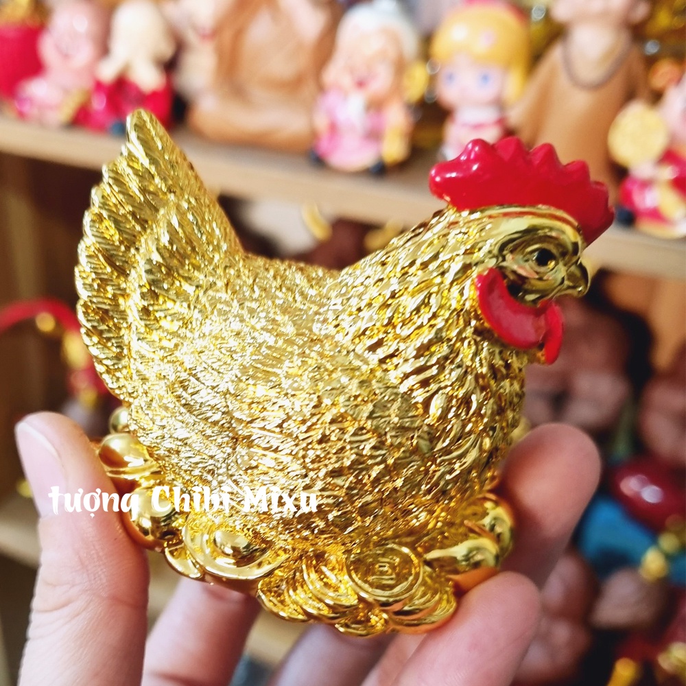 Tượng gà mái ấp trứng vàng may mắn tài lộc