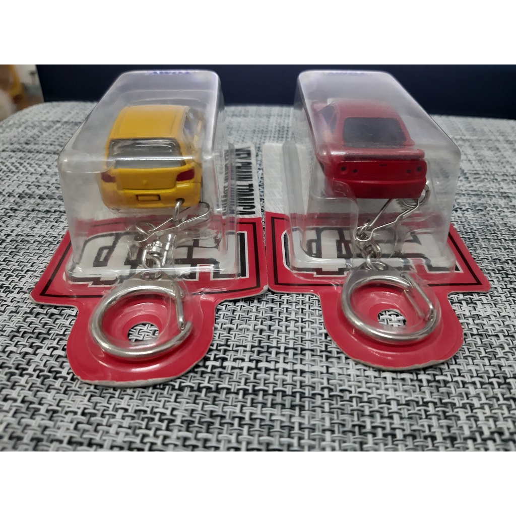 Bộ mô hình Hiếm Tomica Keychain 30th Anniversary y2000 Made in China L3 Toyota Vitz Yellow White - C3 Nissan Skyline GTR
