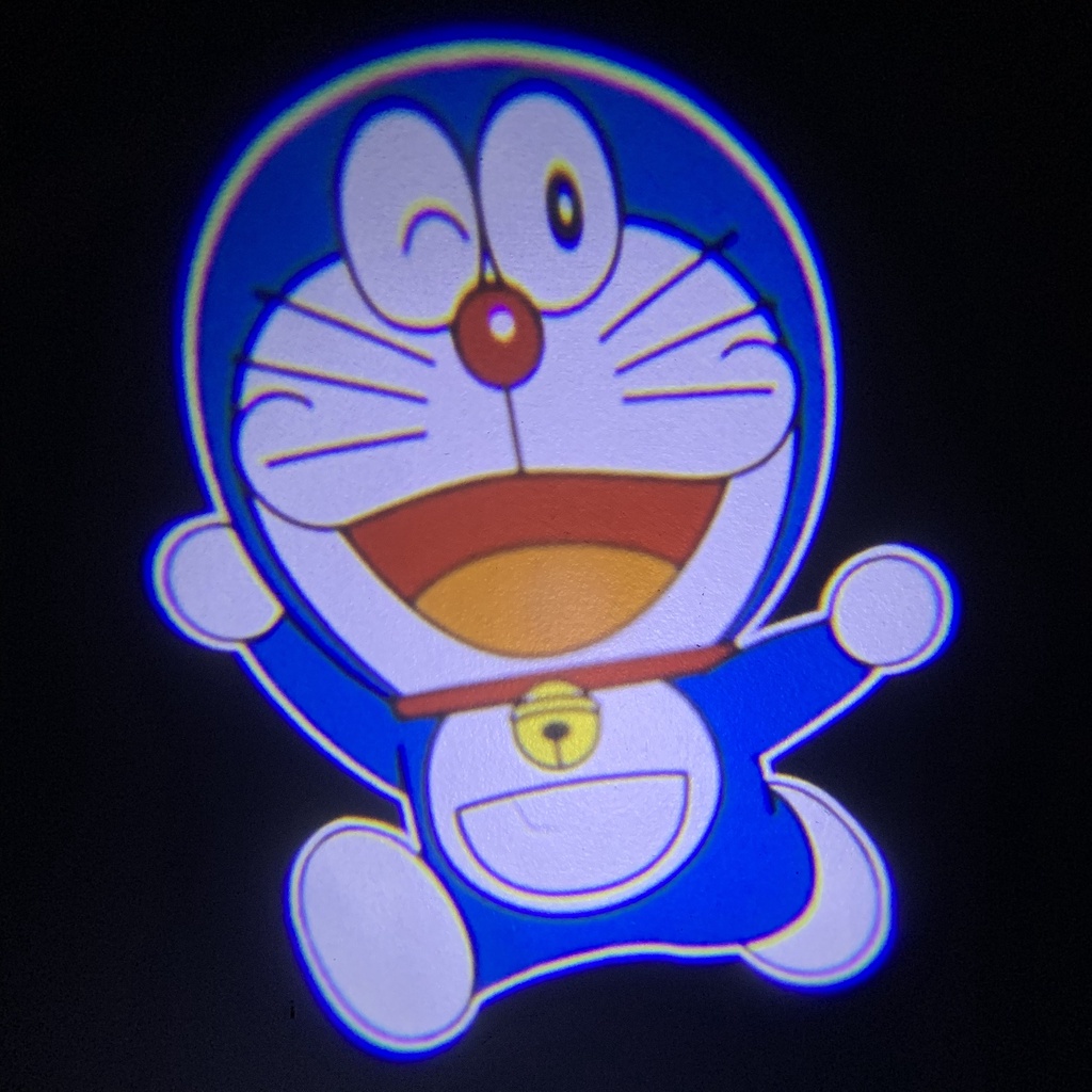 Đèn led gắn xe, đèn led trang trí laser không dây hình hoạt hình gắn cửa xe hơi xe máy