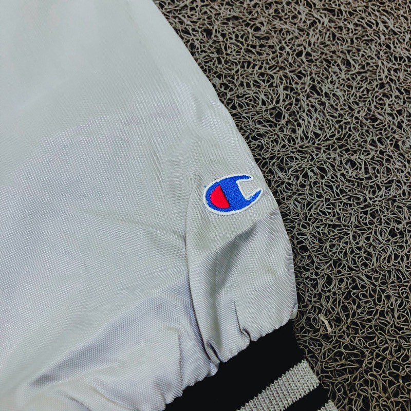 Áo Khoác Gió Màu Đen In Chữ Supreme X Champion Cá Tính