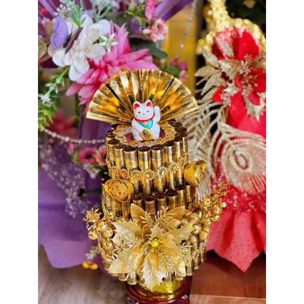 THÁP TIỀN MÈO THẦN TÀI VẪY TAY