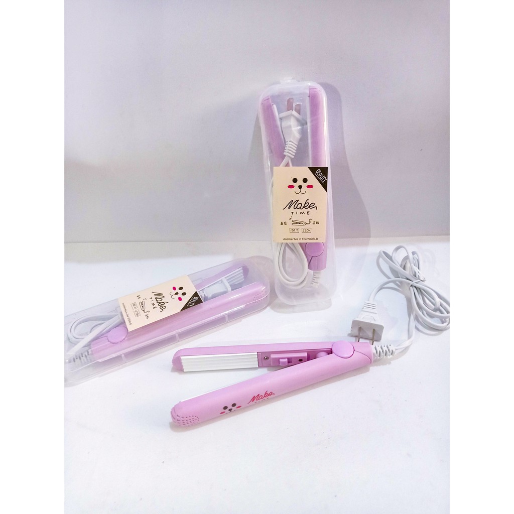 Máy dập xù tóc mini