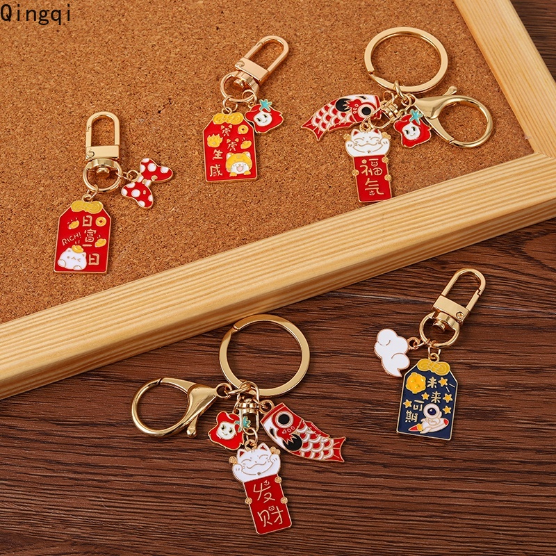 Móc khóa Miss Zoe hình cá vũ trụ hoạt hình may mắn cho nam nữ