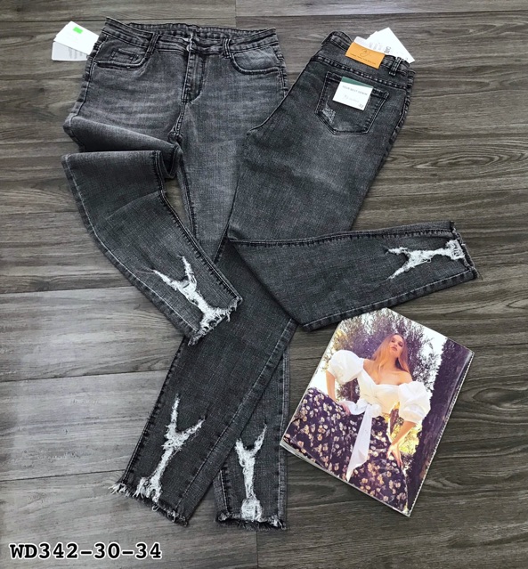 Quần jean xám rách lai