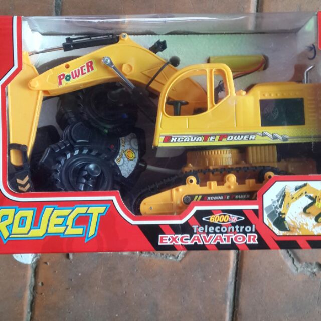 Xe cau dat dieu khien tu xa...giup tre nang dong hon.danh cho tre tu 3 tuoi tro len.thong minh hon.x