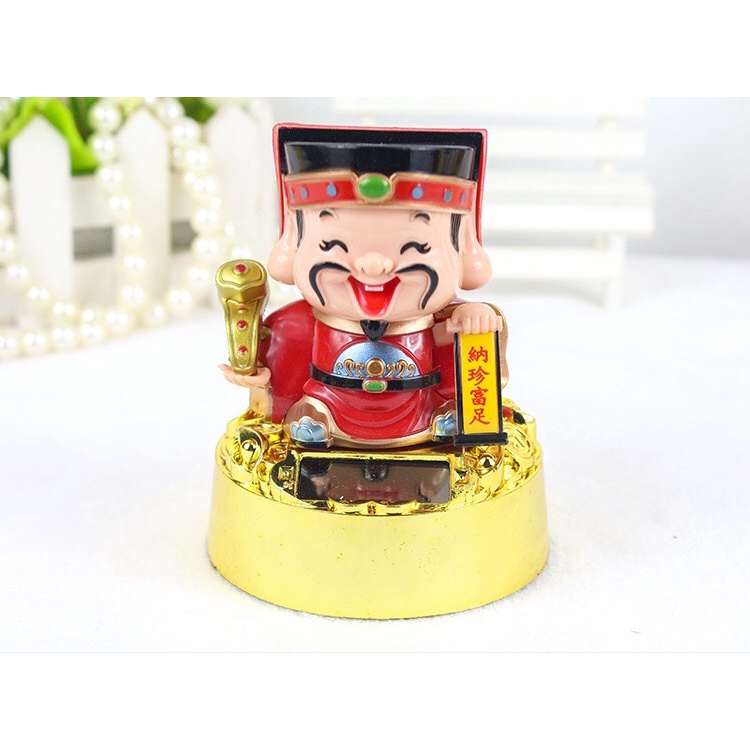 Tượng thần tài gật đầu năng lượng