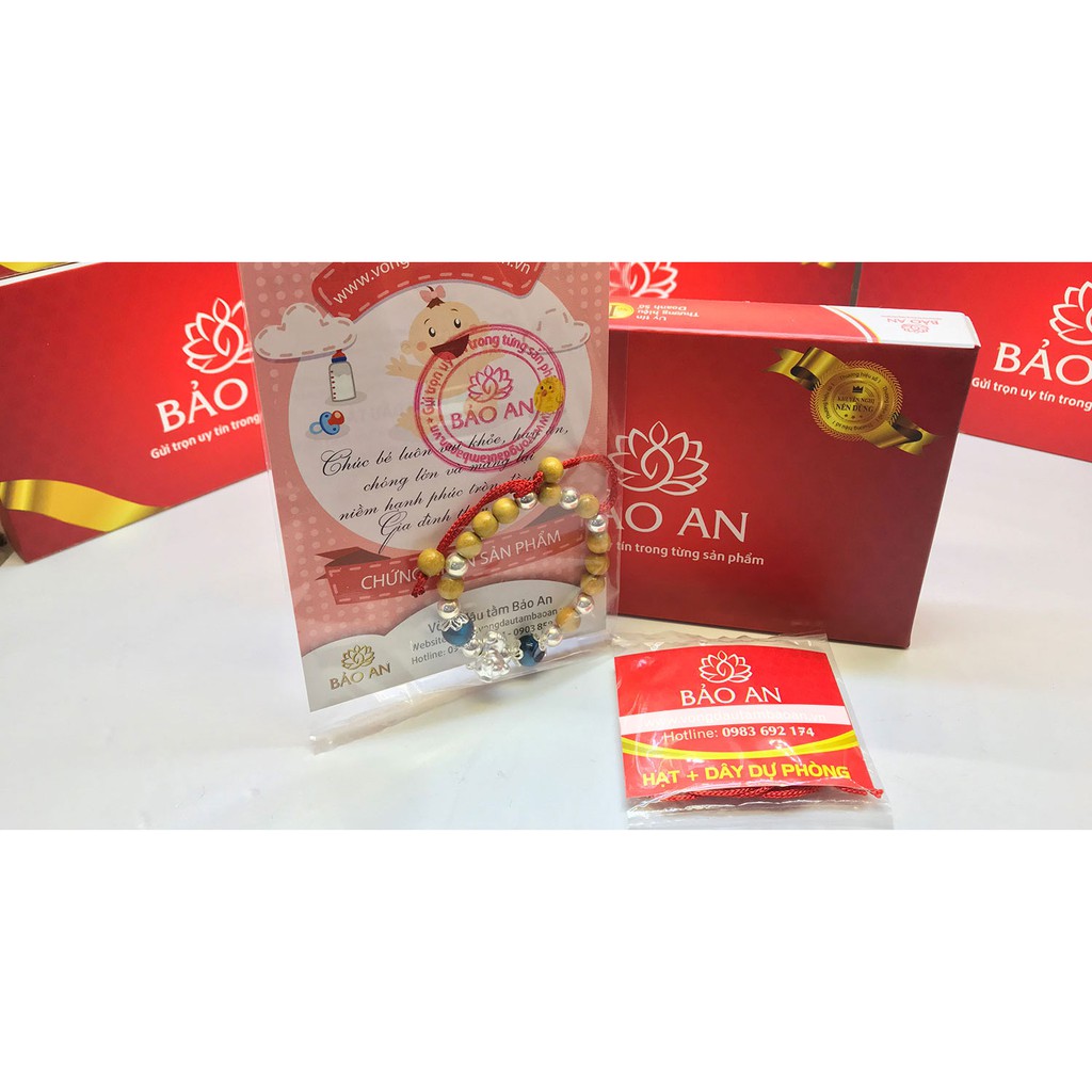 Vòng dâu tằm mix bi bạc vân và charm canh tý 2020