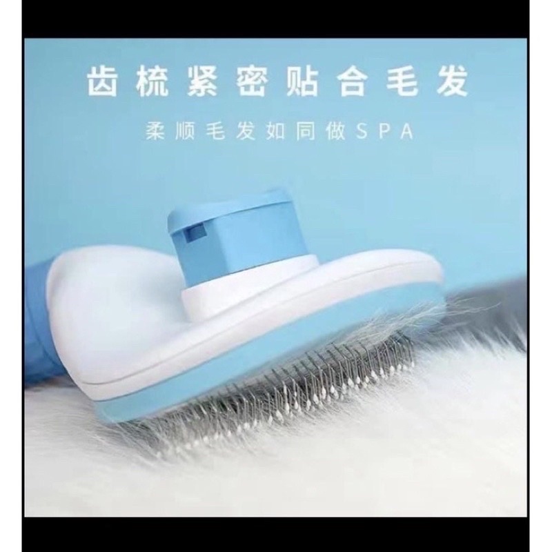 Lượt chải lông có nút bấm cho mèo