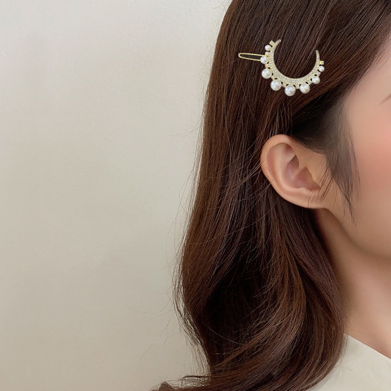 Kẹp tóc hình mặt trăng đính đá lấp lánh sang trọng