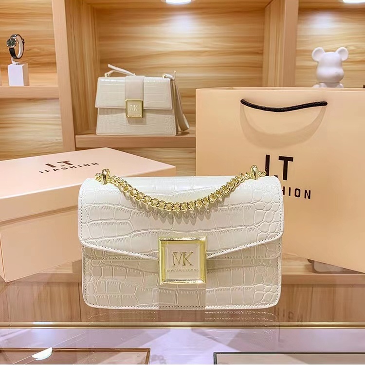 Hong Kong design Genuine leather new fashion woman bag chain shoulder bag cross body bag Axillary package