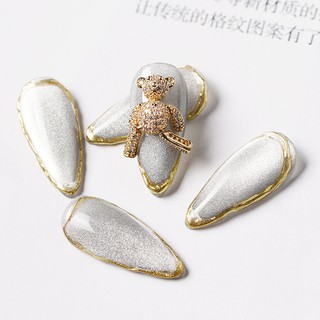 Charm gấu đá chuyển động đính móng