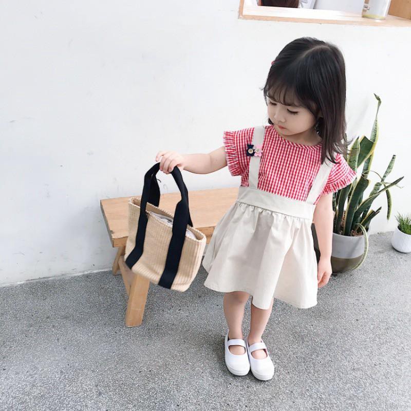 Set áo sơ mi ngắn tay + chân váy caro đính nơ dễ thương cho bé gái