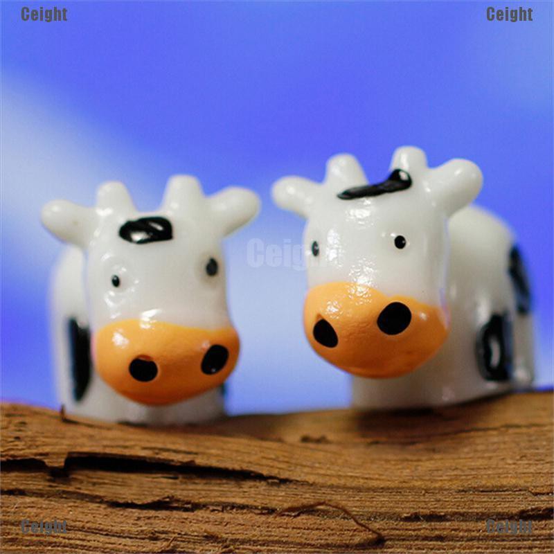 Bộ 2 mô hình chú bò sữa dùng trang trí tiểu cảnh đẹp mắt