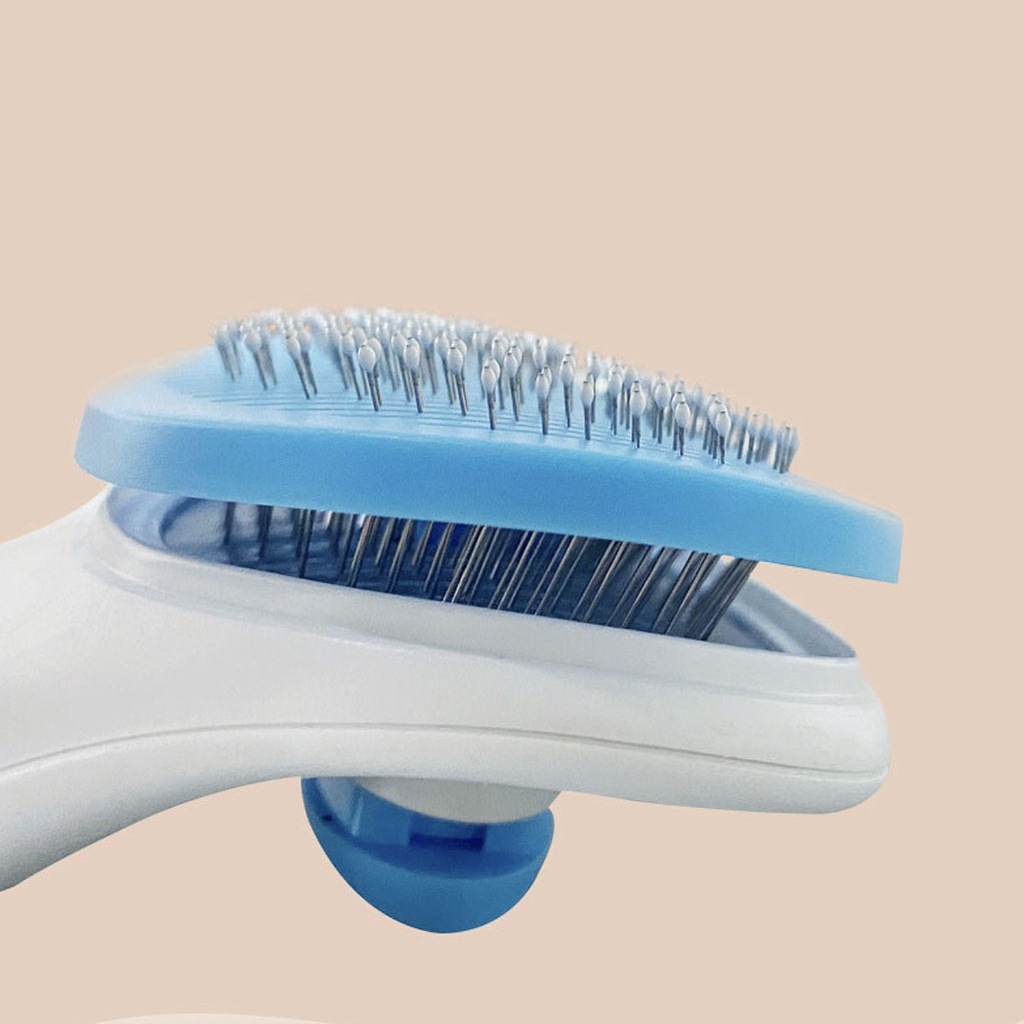 Lược gỡ rối chải lông thú cưng chó mèo có nút bấm lấy lông có hộp