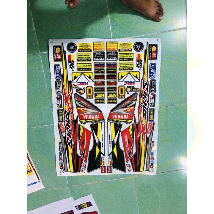 ( Quí khách vui lòng mang ra tiệm cho thợ dán ) Tem SIRIUS CHỮ X ĐỎ ĐEN