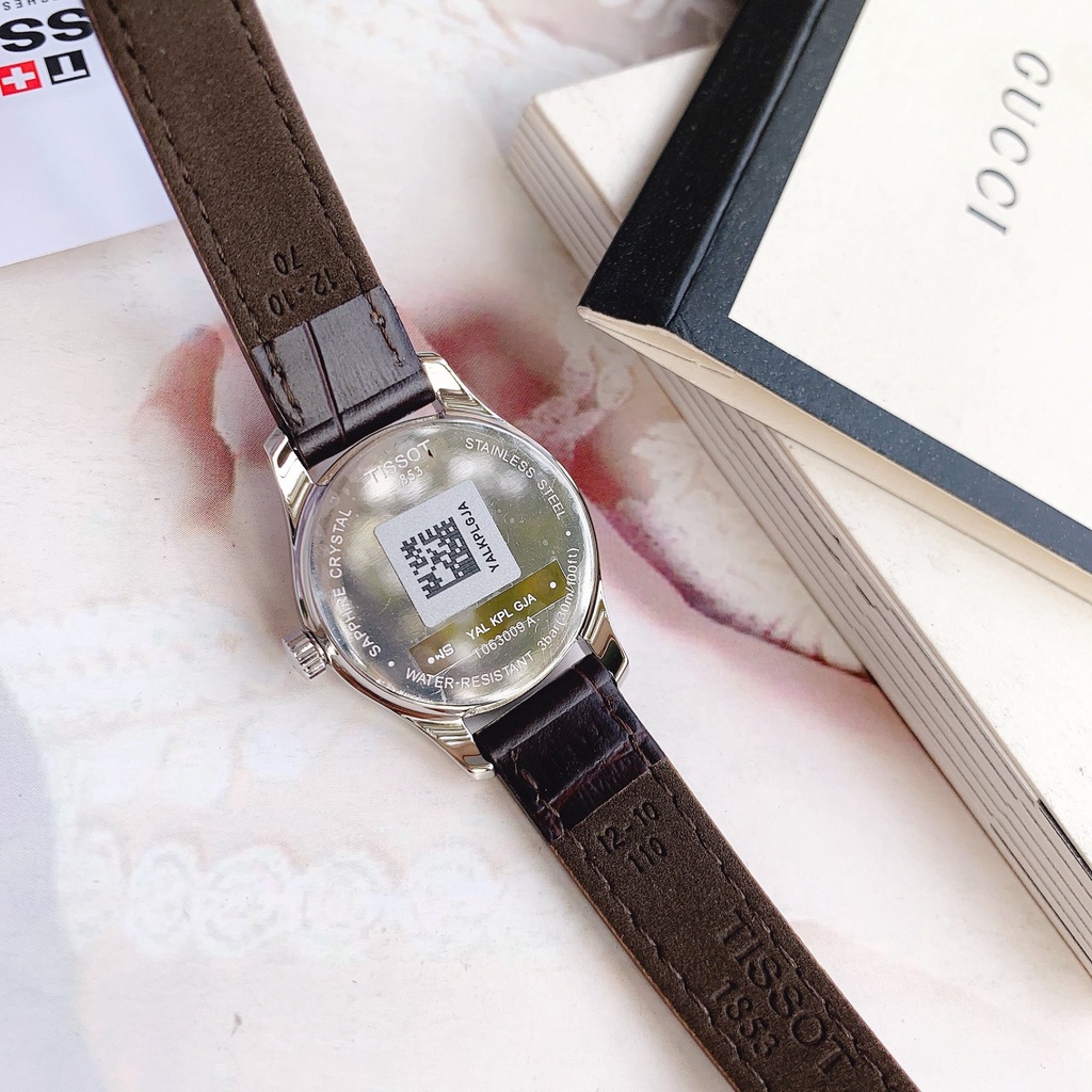 Đồng Hồ Nữ Tissot Tradition 5.5 White Dial Brown Leather T063.009.16.018.00
