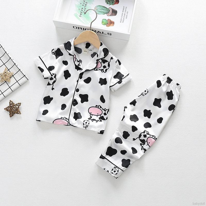 Set đồ ngủ quần short vải lụa lạnh ngắn tay in hình bò sữa cho bé 1-10 tuổi