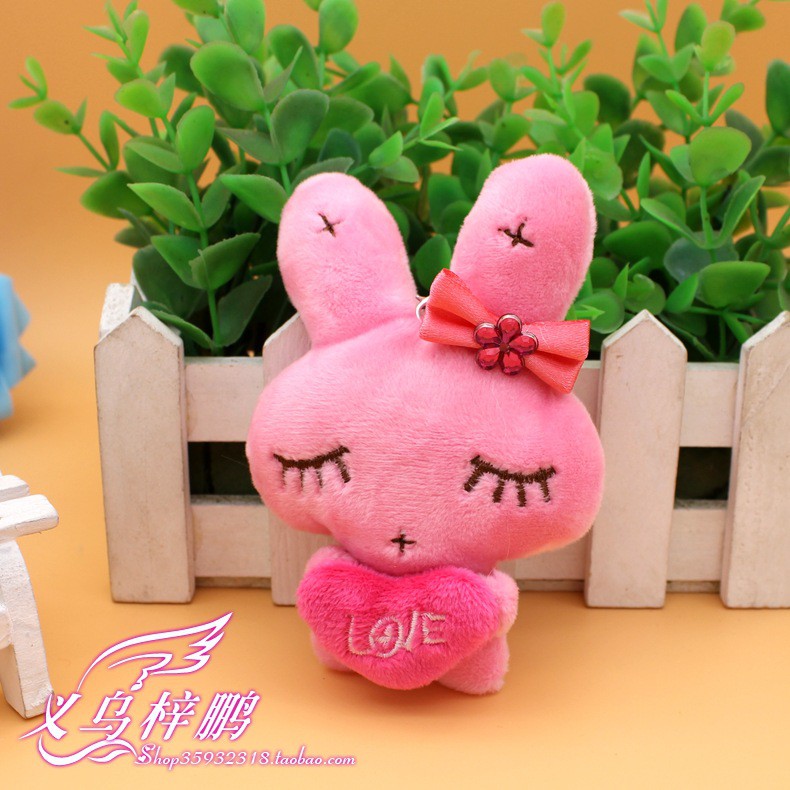 Gấu bông giá rẻ. Thỏ bông nơ ôm tim