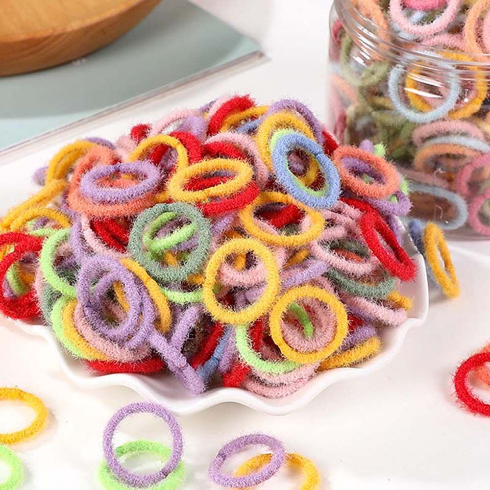 Set 100 dây buộc tóc co giãn bọc vải bông nhiều màu sắc dễ thương cho bé gái