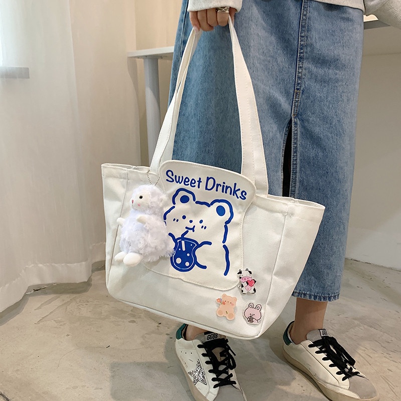 Túi tote đeo vai bằng vải canvas mềm màu trơn in họa tiết phong cách phương Tây mới cho nữ