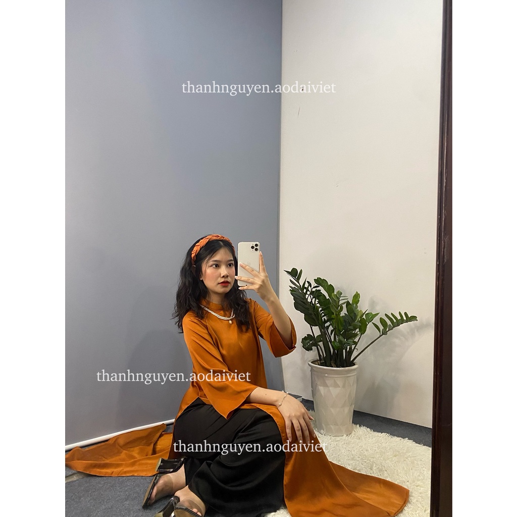 Áo dài cam đất cách tân tay loe lụa Ngọc Trai