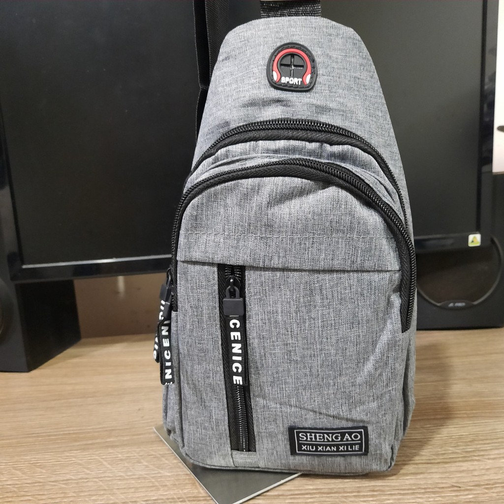 Túi đeo chéo nam vải bố chỉ kéo lề trái phối đỏ GG96 Shalla