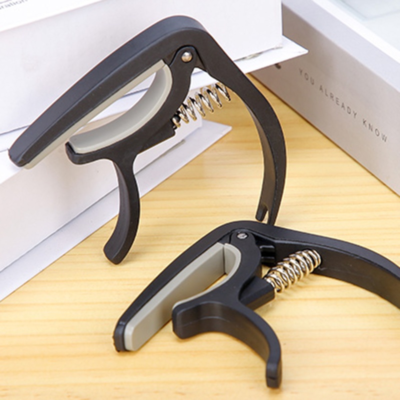 Capo 4 Dây Đàn Guitar 6 Dây Bằng Nhựa Nylon Và Silicone Tiện Dụng