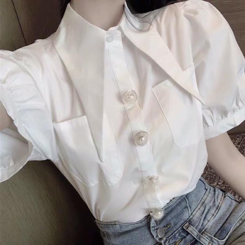 áo sơmi tay ngắn cổ xéo nhọn tam giác dài kiểu nút hai túi tay ngắn phồng