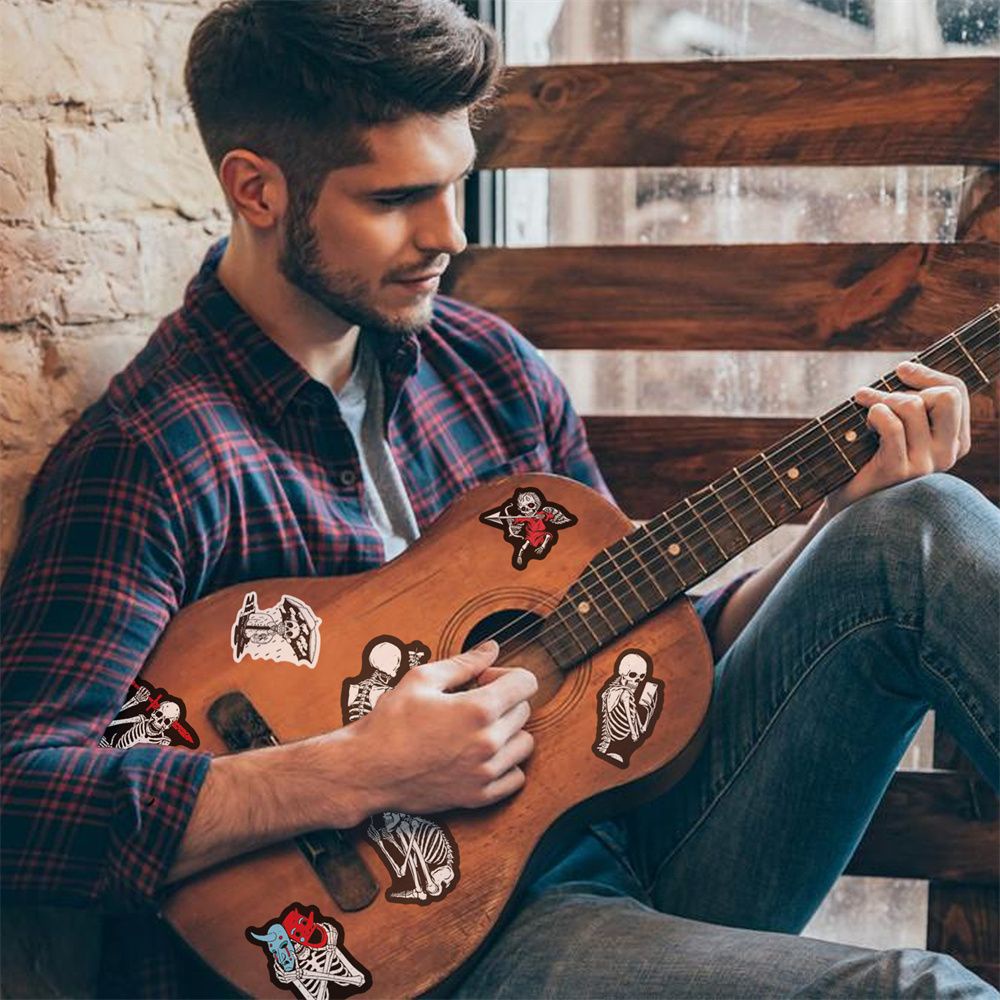 Set 50 miếng dán hình đầu lâu màu đỏ và đen trang trí laptop notebook đa năng