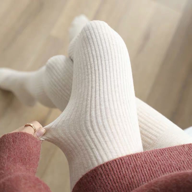 Quần legging nữ sọc dọc cotton Nhật Bản là loại quần legging chín điểm mỏng và ấm áp để mặc bên ngoài