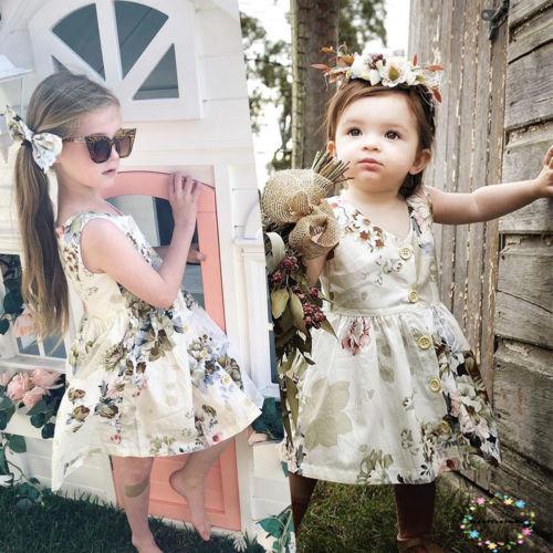 Váy mini không tay áo với họa tiết hoa dùng cho bé gái