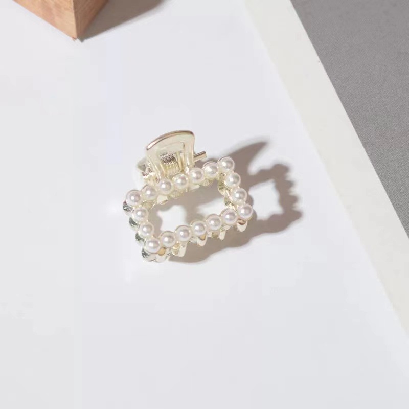 Kẹp tóc nơ đính ngọc trai dễ thương