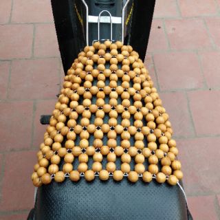 Lót yên xe máy hạt gỗ, đệm hạt gỗ giảm ê mông thoáng khí