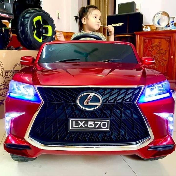 Ô tô điện trẻ em BABY-KID LEXUS 570 2 chế độ tự lái và remote, 2 chỗ ghế đôi, 4 động cơ lớn, ắc qui 12v ( Đỏ-Trắng-Đen )