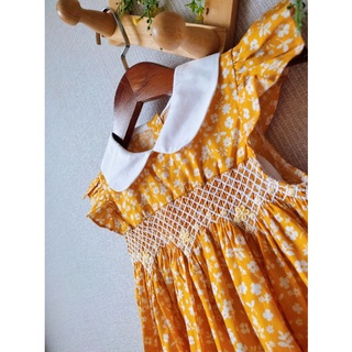 Đầm smock Daisy vàng