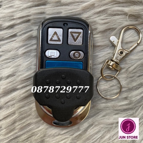 Điều khiển cửa cuốn sao chép mã nhảy sóng 315,336,365 pin siêu bên