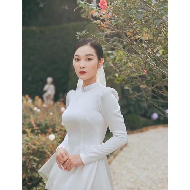 [𝐌𝐀𝐑𝐈𝐀] ÁO DÀI CÔ DÂU MÀU TRẮNG LỤA ĐÍNH NGỌC TRAI TAY BỒNG
