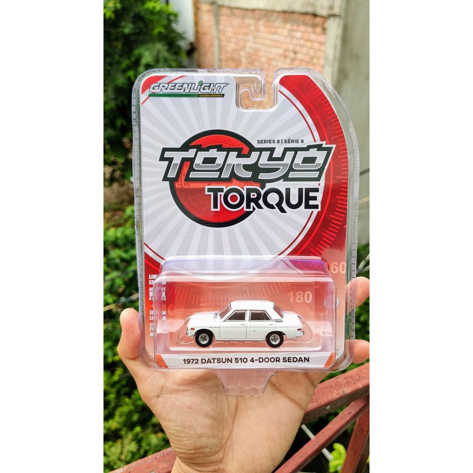 Mô hình tĩnh Greenlight 1972 Datsun 510 4 doors sedan Tokyo Torque tỷ lệ 1:64