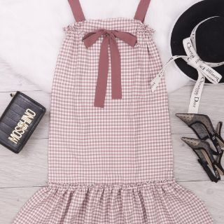 Đầm caro hồng nơ ngực