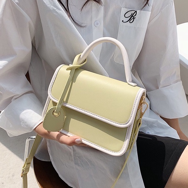 Túi xách nữ cầm tay, da trơn phối viền nổi bật hàng mới 2022 SL37