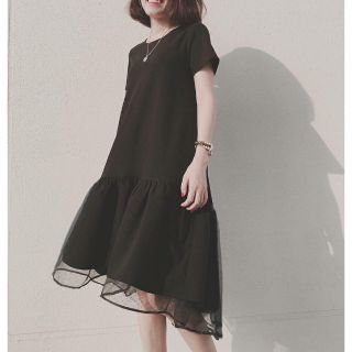 Đầm bầu đen đuôi phối ren lưới