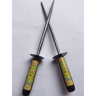 Liếc dao kéo bằng nhíp ( làng nghề )