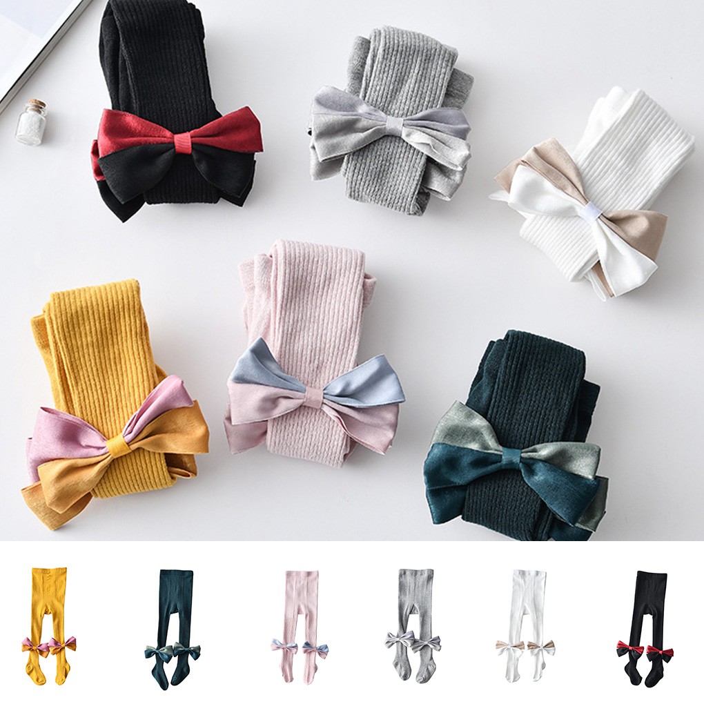 Quần liền tất màu trơn phối nơ thắt dành cho bé gái sơ sinh