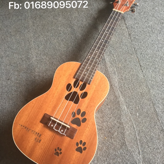 Đàn Ukulele dấu chân chó