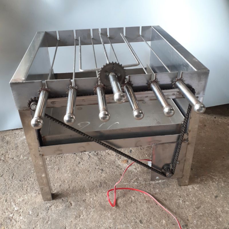 Máy nướng thịt chả quay gà vịt tự động bằng inox 6 xiên