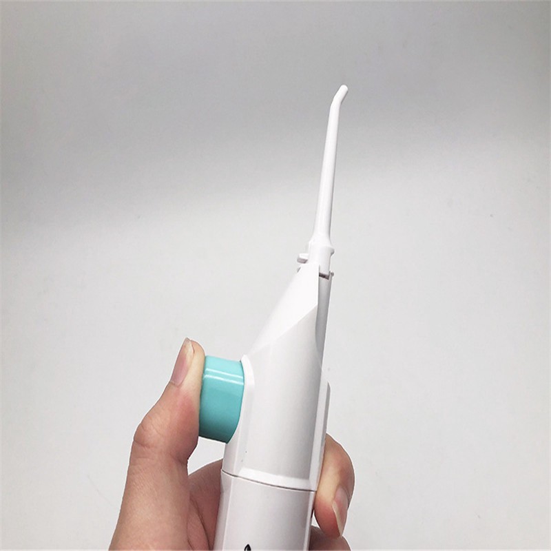 Máy Xịt Nước Cầm Tay Vệ Sinh Răng Miệng