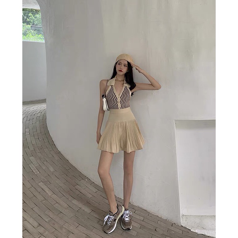 Chân váy xếp li ngắn lưng cao dáng chữ A. | BigBuy360 - bigbuy360.vn