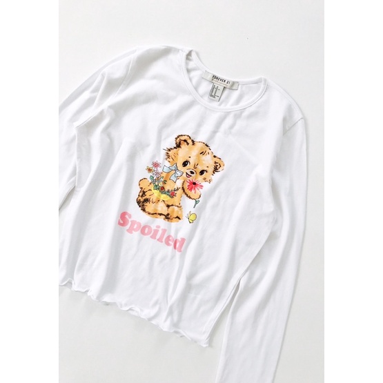 Áo croptop trắng dài tay xoăn lai in con gấu vnxk